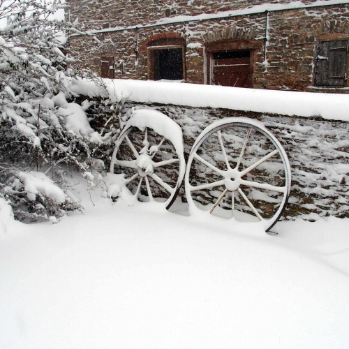 Wheels at Upper Heath Farm in the wintery snow, Self Catering house in Shropshire England